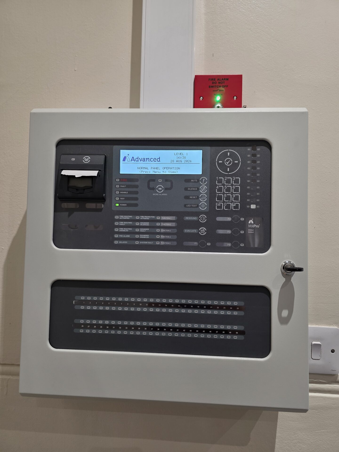 serviced fire alarm control panel with the outer shell closed